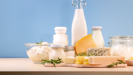 assorted dairy items displayed on wooden surface