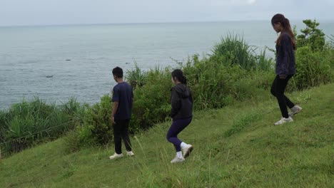 group of friends enjoying a coastal view