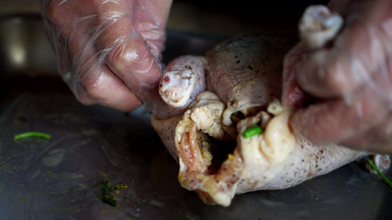 Preparing a Stuffed Chicken for Cooking