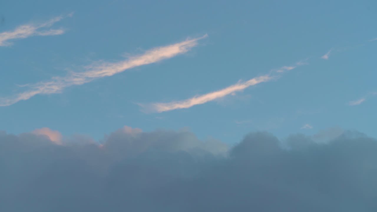 Cloudy Blue Sky Filled with Cirrus and Cumulonimbus Clouds