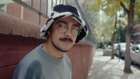 portrait of young gen z man on the street