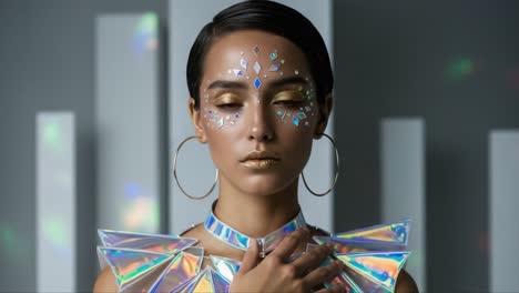 Captivating Portrait of a Model with Radiant Holographic Makeup and Geometric Accessories, Showcasing Futuristic Fashion and Unique Artistic Expression