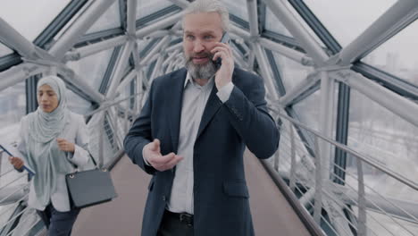business people on a modern bridge
