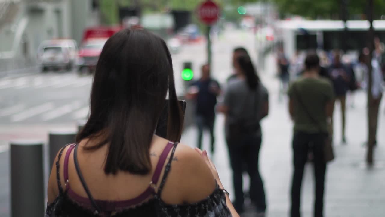 Slow Motion of Young Woman With Smartphone on Sidewalk in New York Manhattan USA