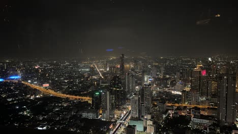 city overview bangkok aerial timelapse at night, thailand. skyscrapers and traffic