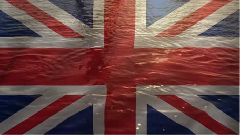 british flag with water flowing in the background