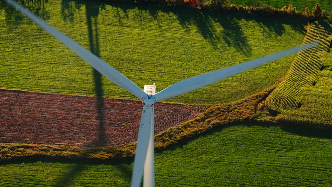 Aerial View of Wind Turbine and Agricultural Fields