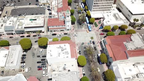 Drone-Shot-of-Downtown-Westwood-in-Los-Angeles,-California-with-Views-of-City-Life-on-a-Warm-Summer-Day