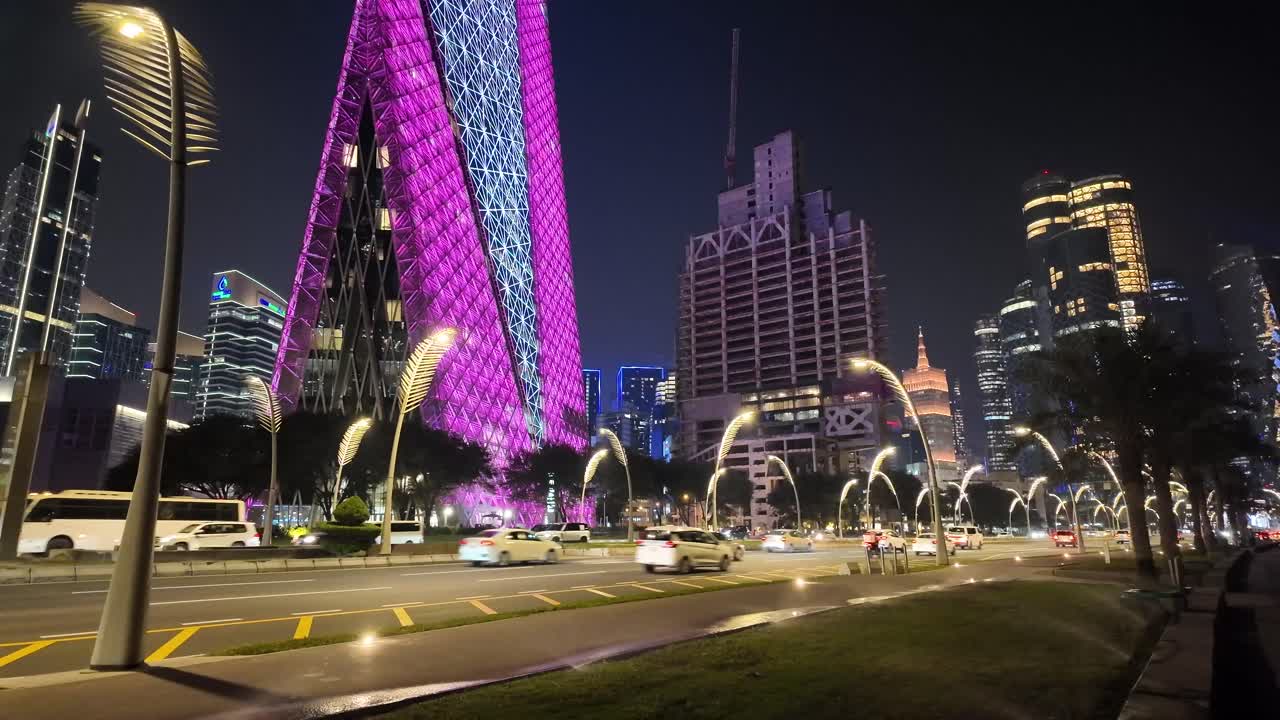 Cityscape at Night with Illuminated Buildings