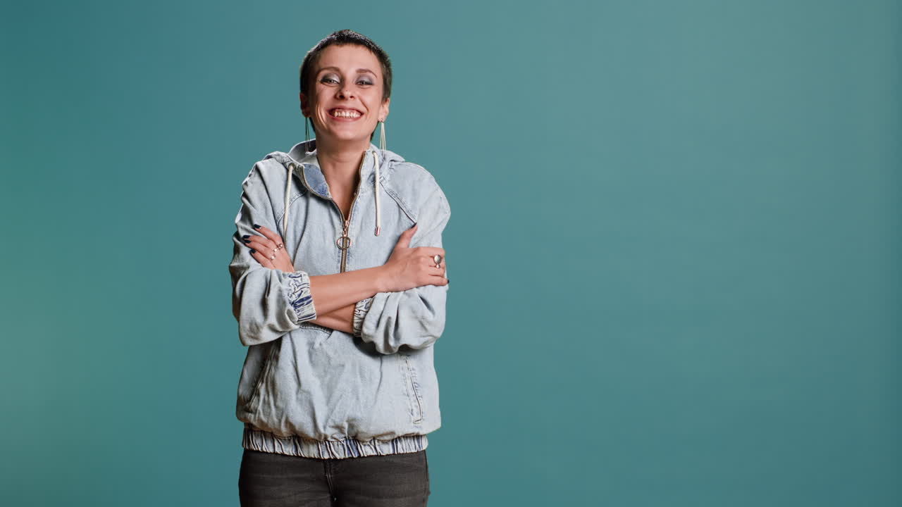 Portrait of a Stylish Woman with Arms Crossed
