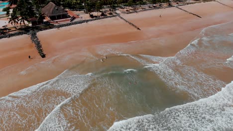 A-beautiful-drone-shot-taken-at-a-beach-in-Ghana,-Africa-on-the-western-coast