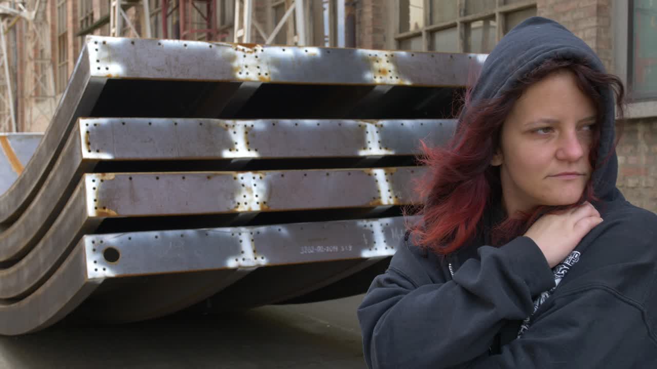 Mysterious Girl standing trying to hide her identity