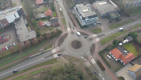 aerial view of traffic using busy roundabout