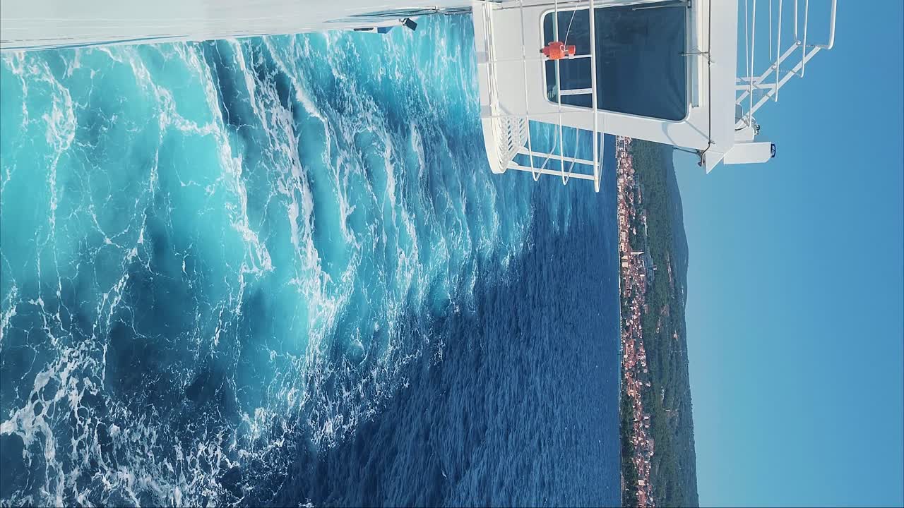 Water Bow Breaks of Sea Waves of Water Surface. Crashing Waves Bow of a Cargo Vessel Shipping Sailing Water Travel Boat. Boat Breaking Waves.