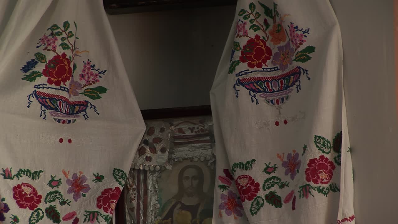 Icons with Jesus and Father in the old Ukrainian rural house