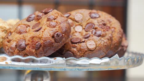 close-up of chocolate chip cookies on a glass plate