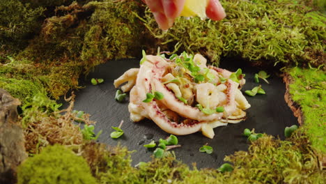 lemon-squeezed seafood salad on moss