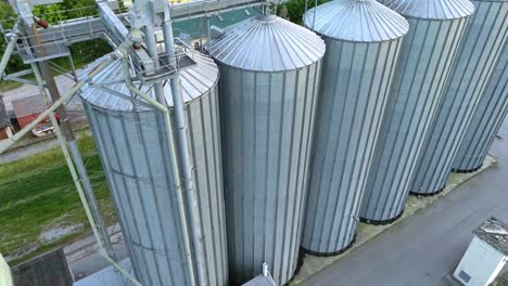 aerial view of farm grain silos for agriculture - drone shot