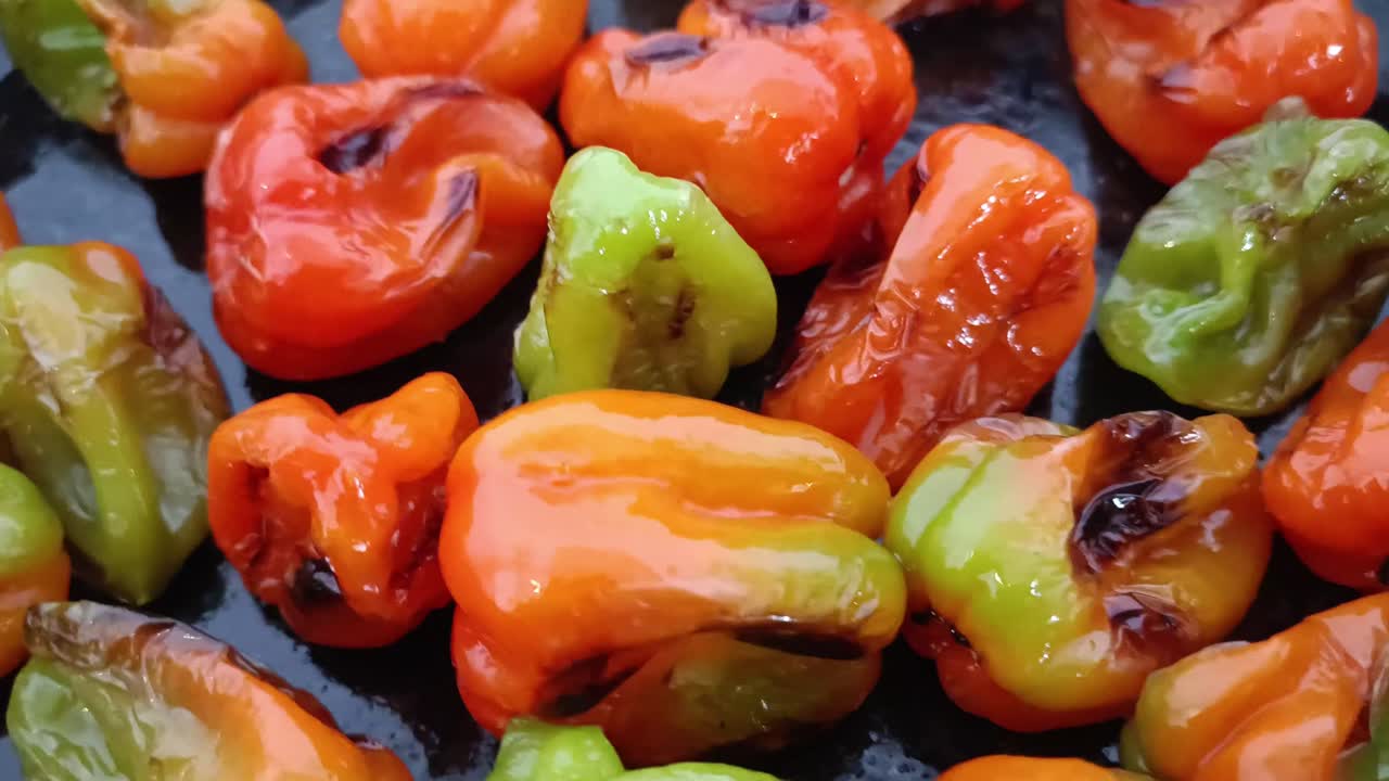 Roasting habanero peppers on a hot pan, vibrant colors, rustic cooking vibes