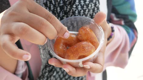 woman eating turkish delight