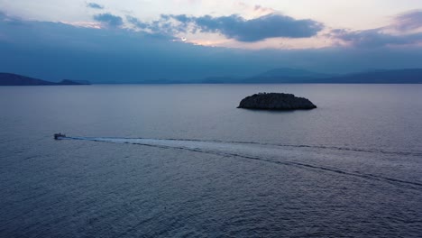 A-small-island-in-front-of-Vlychos-Plakes-Beach-in-Hydra-Island-Greece