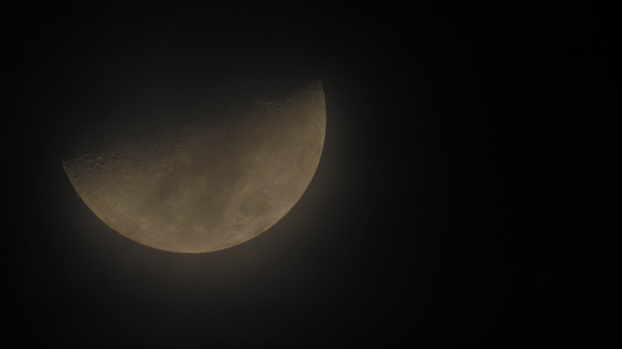 Moon behind the clouds