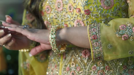 woman in traditional pakistani dress with jewelry