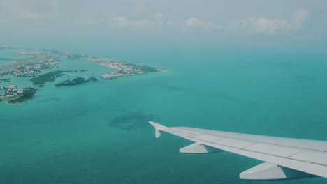 bermuda aerial view from plane window of st george's and turquoise water around islands in st george's harbour