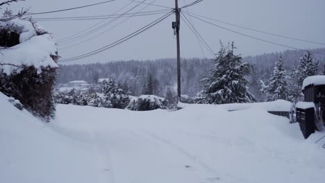 Man-is-removing-snow-from-the-front-of-the-house-after-big-snow-storm-in-Norway