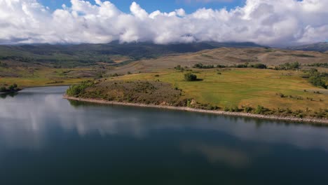 Aerial-View-Beautiful-Landscape-of-Colorado-USA-in-Spring-Season,-Lake-and-Green-Fields,-Drone-Shot