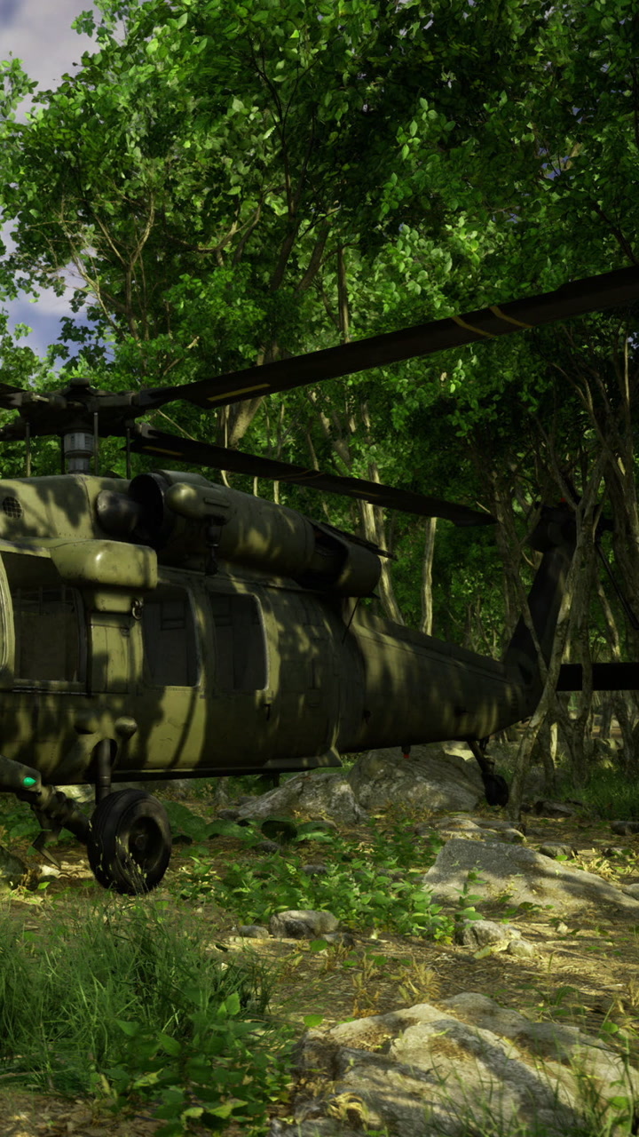 Helicopter on a forest path surrounded by trees and rocks in daylight
