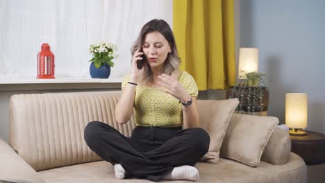 The-young-woman-is-talking-on-the-phone,-arguing.