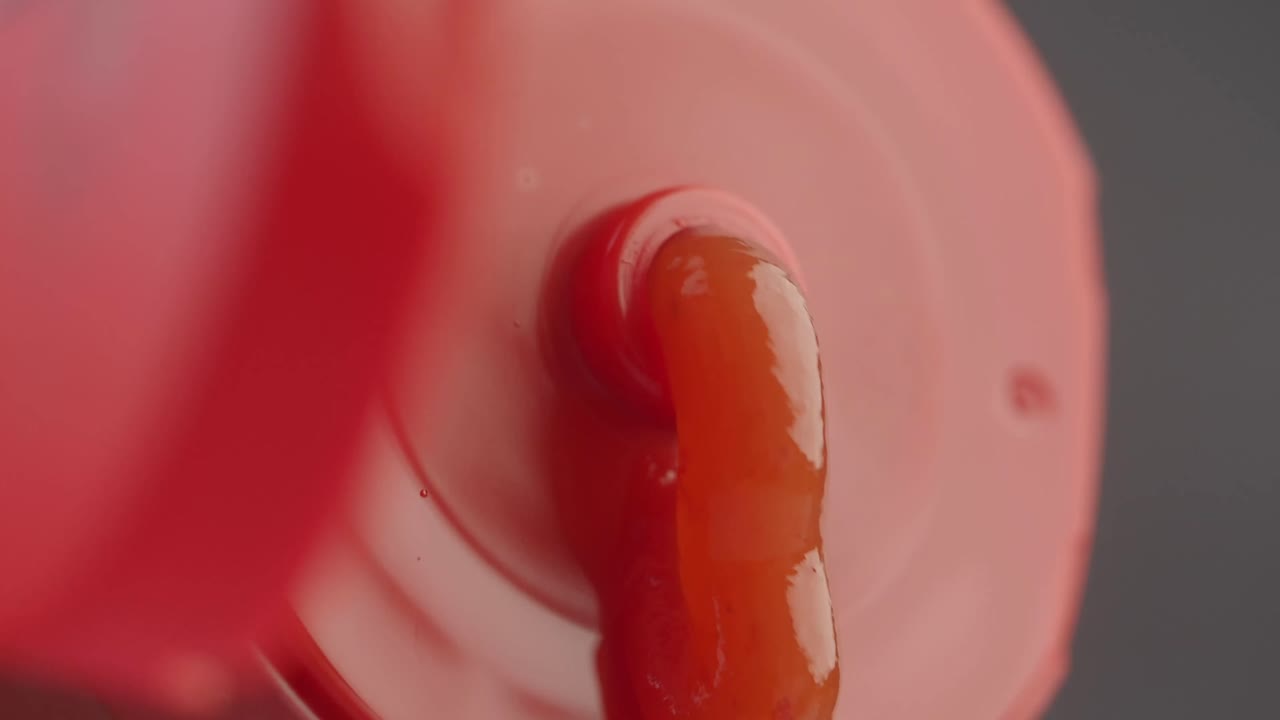 Pouring Sauce from Bottle