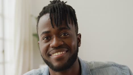 Portrait-of-a-man-at-home-smiling