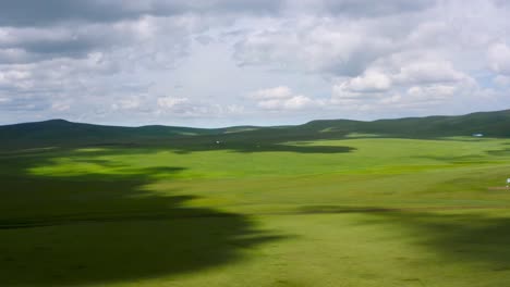 Lush-Hilly-Landscape-With-Clouded-Sky-In-Hulunbuir,-Inner-Mongolia,-China