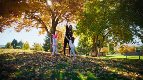 happy family enjoying autumn day in the park