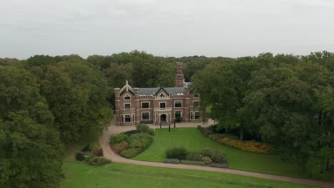 aerial of schaffelaar castle, a beautiful mansion on a green estate