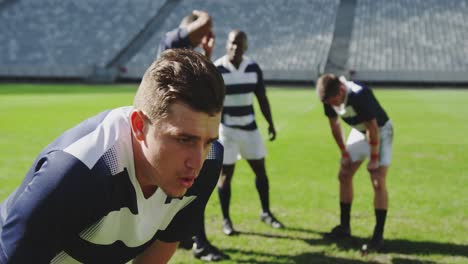 male rugby player disappointed after losing match in stadium 4k