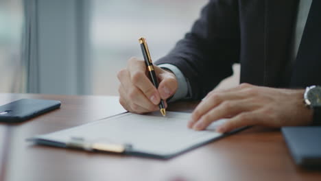 thoughtful executive manager signing contract sitting modern office desk closeup