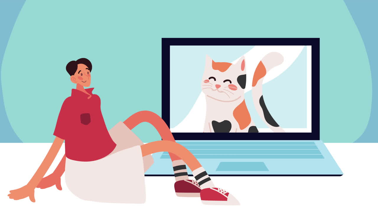Pria Duduk Menonton Video Kucing di Laptop