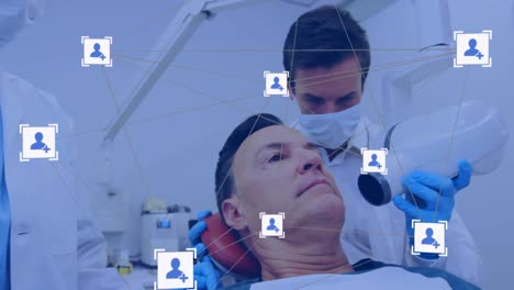 animación de redes de conexiones con iconos sobre el hombre en la silla del dentista