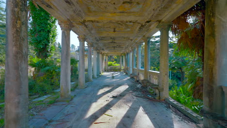 ruined colonnade in a tropical garden