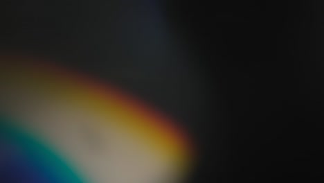 abstract light leaks on black background.