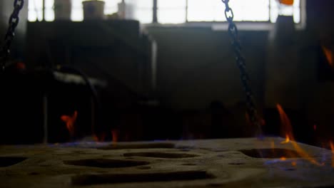 Close-up-of-mold-heating-in-foundry-workshop-4k