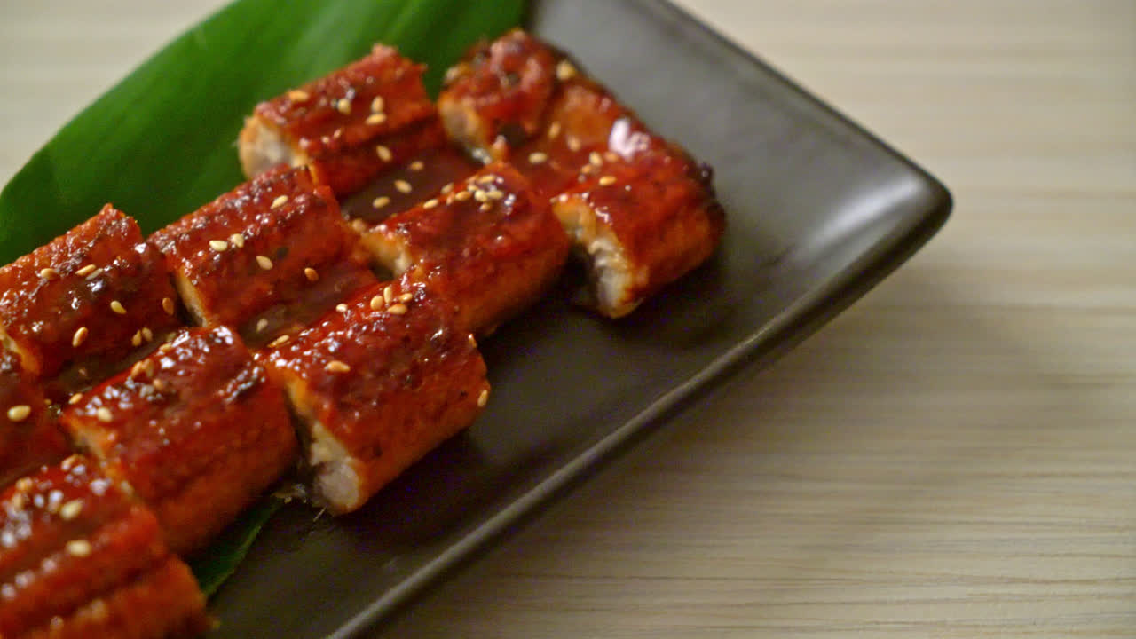 sliced grilled eel or grilled unagi with sauce (Kabayaki) - Japanese food style