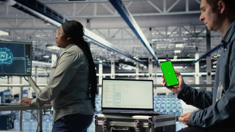 server room software developer using mockup phone