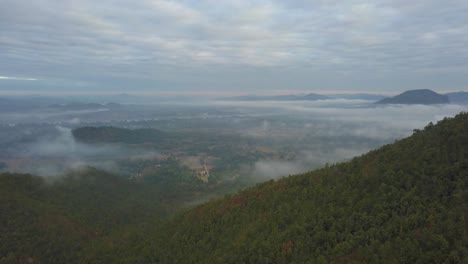 The-Wonderful-Foggy-Lush-Mountain-In-Thailand-Under-The-Cloudy-Sky---Aerial-Shot