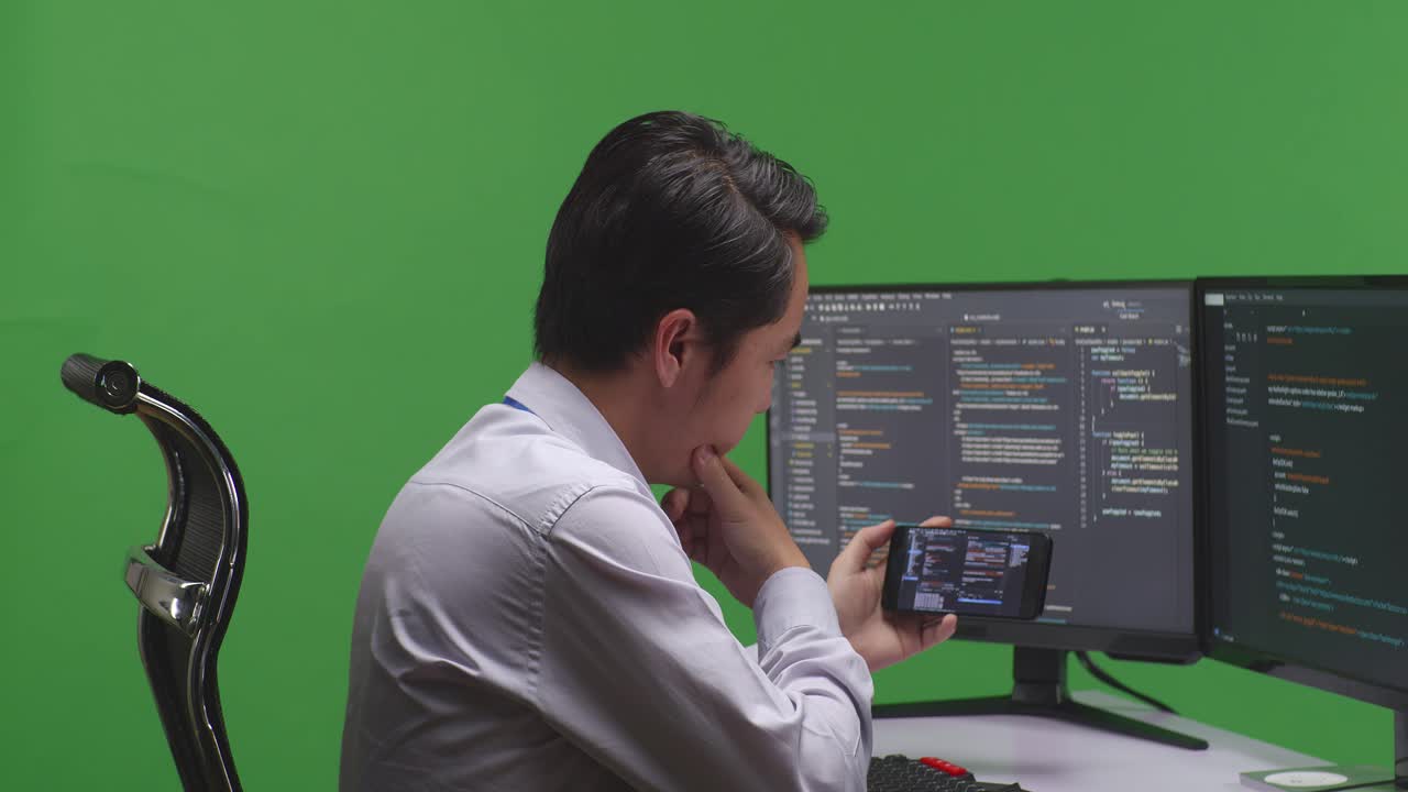 Programmer working on code on a computer