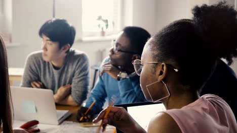 woman boss leading office team meeting. young multiethnic creative group discussing business strategy development. 4k