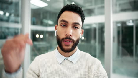 man on a video call in an office